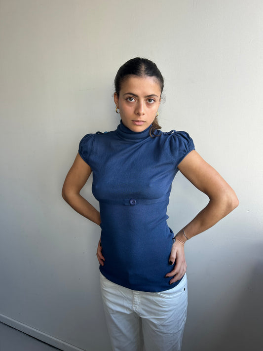 Navy turtleneck with puff sleeves and waistband
