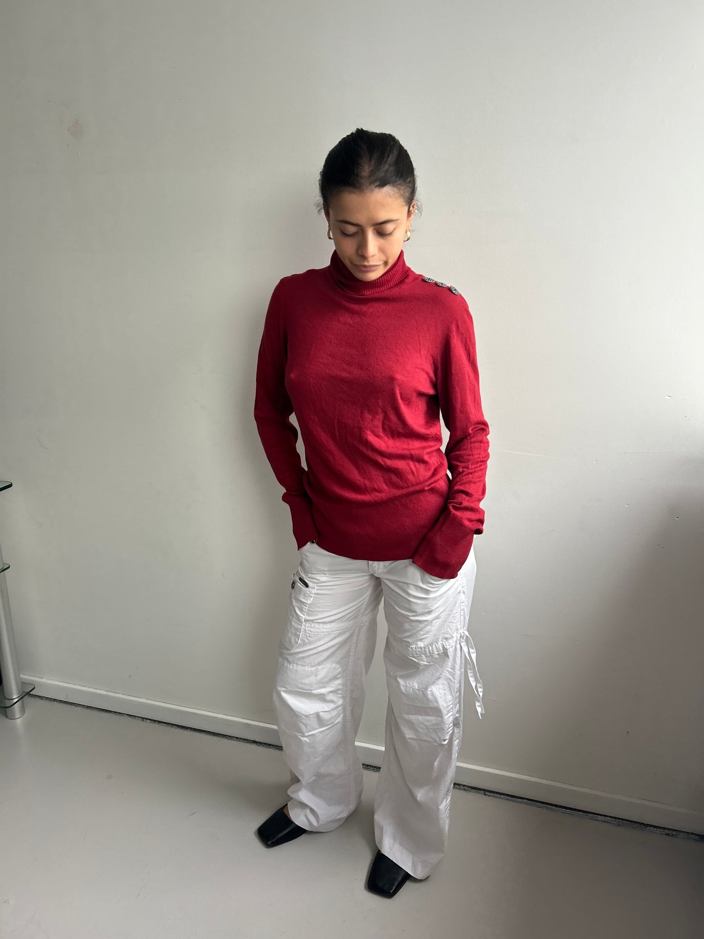 Red Turtleneck with Polka Dot Button Detail