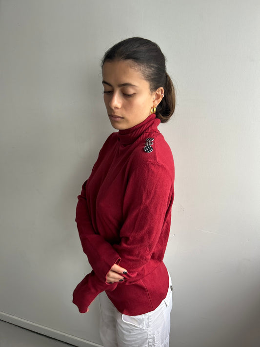 Red Turtleneck with Polka Dot Button Detail