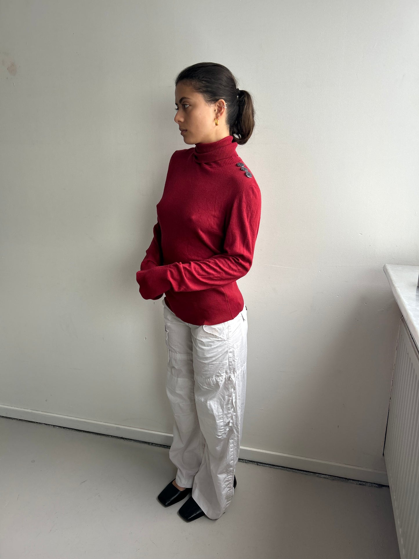Red Turtleneck with Polka Dot Button Detail