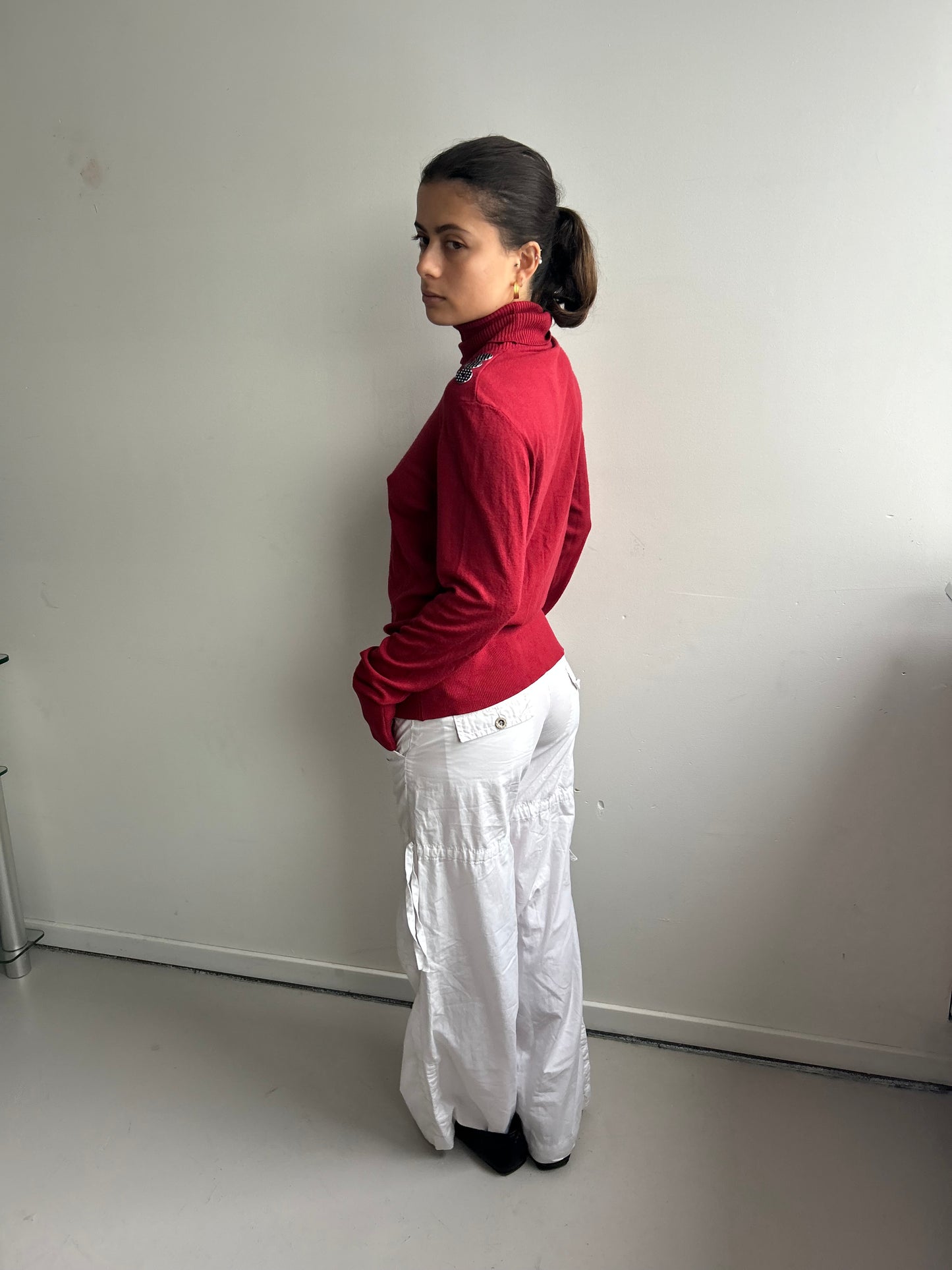 Red Turtleneck with Polka Dot Button Detail